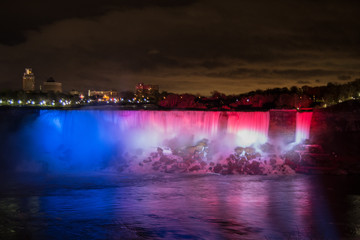 Niagara Falls at night lit red, white and blue