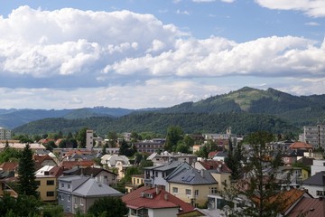 Naklejka na ściany i meble Clouds over the town. Slovakia