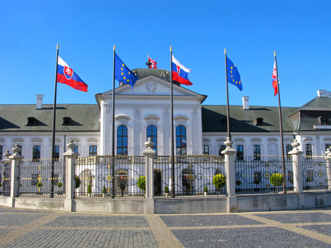 Presidential palace (Grassalkovich palace) in Bratislava. Slovakian flags and flags EU in front of the palace.