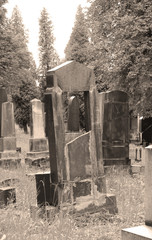 beautiful old tombstones on the jewish cemetery in ochre tones in Frydek-Mistek, Czech Republic, July 2, 2017