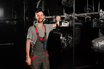 The lighting engineer adjusts the lights on the stage.