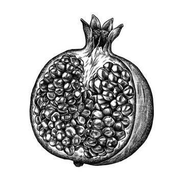 black and white pomegranate fruit cut open