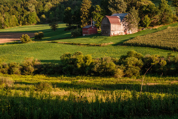 Farm in the Valley at Sunset