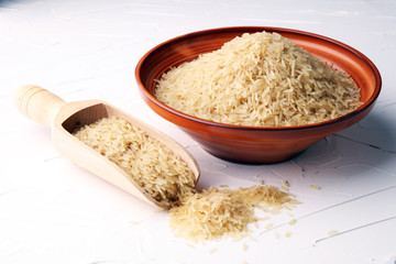 rice, indian basmati, pakistani basmati uncooked on white background