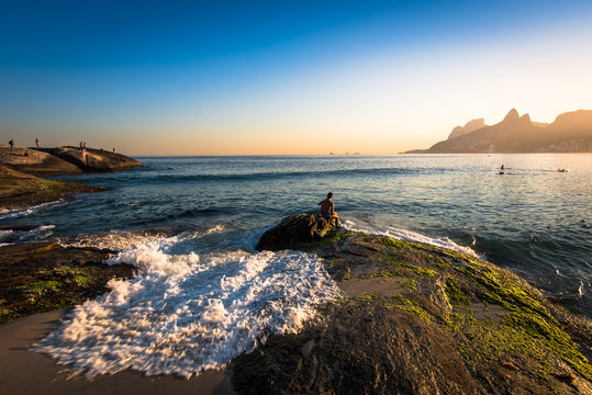 Waves Washing the Arpoador Rock During Sunset in Rio de Janeiro