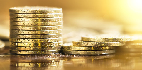 Golden coins - website banner of money savings concept