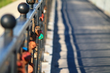 Locks  on russian bridge fence for russian wedding tradition