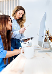 Two women in a modern office