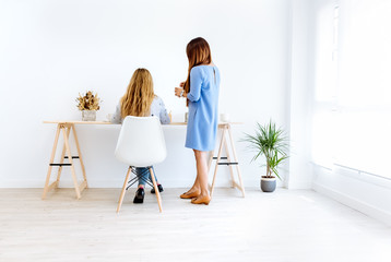 Two women in a modern office