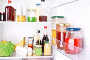 Many different sauces in fridge