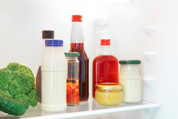 Many different sauces in fridge