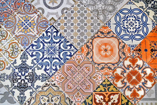 Detail of ornamental ceramic tile with colorful patchwork.