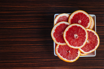 Naklejka na ściany i meble Fresh sliced grapefruit
