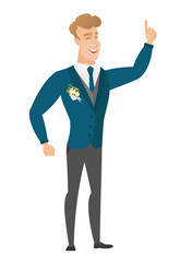 Caucasian groom pointing with his forefinger