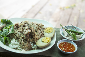 Stewed pork leg on rice in street food ,Thailand.