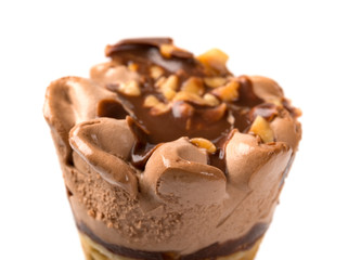 chocolate flavor ice cream cone close up on a white background
