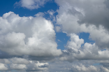 High quality image of cloudy overcast sky before rain. Rainy clouds flying over horizon, cloudscape.