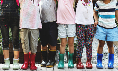 Group of kindergarten kids little farmers learning gardening