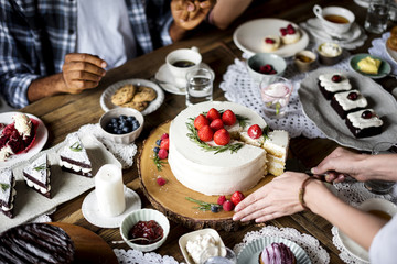 Friends Gathering Together on Tea Party Eating Cakes Enjoyment happiness