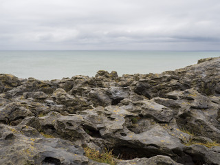 Fototapeta na wymiar Rocky formations By the Ocean
