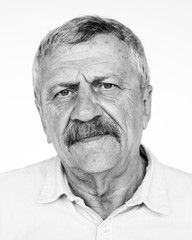 Senior adult man moody casual studio portrait