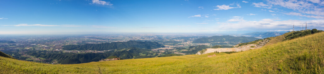 Great landscape on the Padana plain in summer time. Panorama from Linzone Mountain, Bergamo, Italy. 