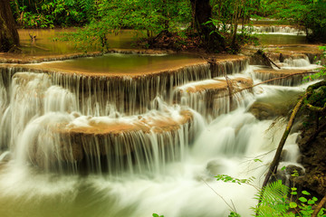 Deep forest waterfall at Huay Mae Kamin waterfall National Park Kanjanaburi Thailand