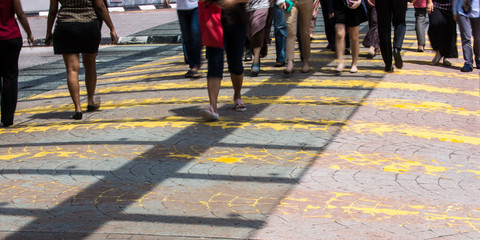 Motion Blur - People crossing the road. Blurry effect to illustrate movement