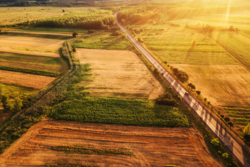 Beautiful aerial view of countryside and fields in sunset