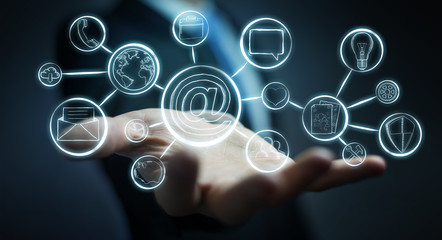 Businessman holding multimedia hand-drawn interface