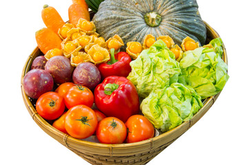 Colorful fruits and vegetables in the basket.