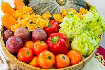 Colorful fruits and vegetables in the basket.