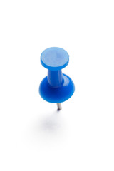 close up of a pushpin on white background