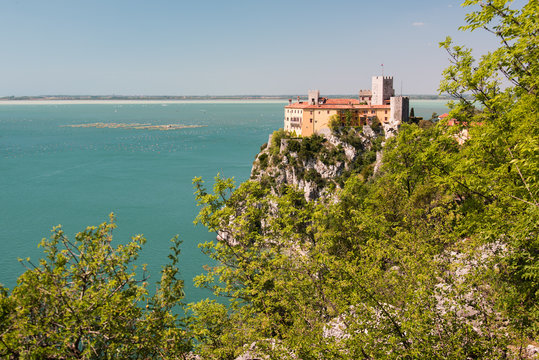 The castle of Duino and the beauty of the cliffs on the rocky coast