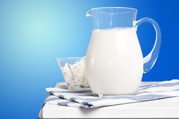 Pitcher  with some milk