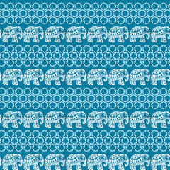 Seamless pattern with elephants and flowers. Background for textile, baby shower, greeting card, wrapping. Floral ornament.