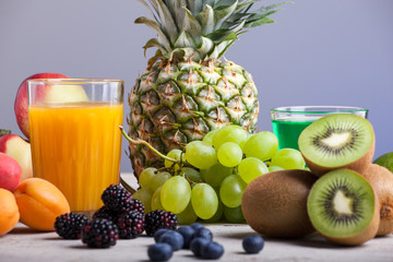 Various fruits on the white wooden table