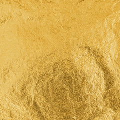 Gold foil leaf metallic wrapping paper texture background for wallpaper decoration element