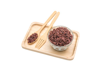 Rice Berry in a spoon and bowl on a white background.