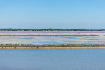      Aigues-Mortes, Salins du Midi, panorama with salt marshes 