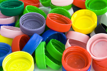 Collection of colorful plastic bottle caps. Still-life picture taken in studio with soft-box.