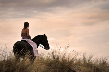 woman and  horse in the sea
