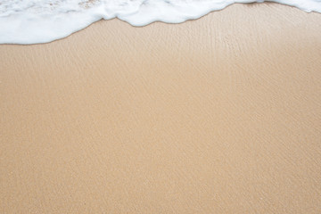 wave of ocean on sandy beach. Background.
