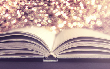 Opened book soft bright light 