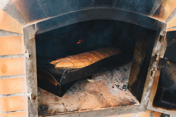 Fillet of salmon roasted in a firewood oven