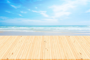 Fototapeta premium Empty white wooden table over blue sea background.
