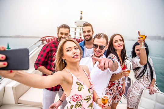 People celebrating on a yacht