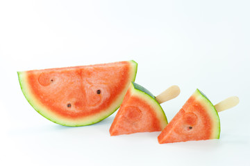Tiny watermelon popsicle shaped and sliced