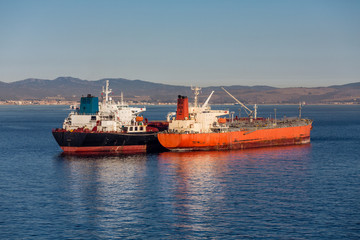 Fototapeta premium Black and Orange Tankers in Gilbralter