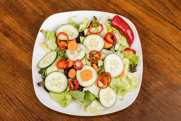 Red Peppers on Green Salad